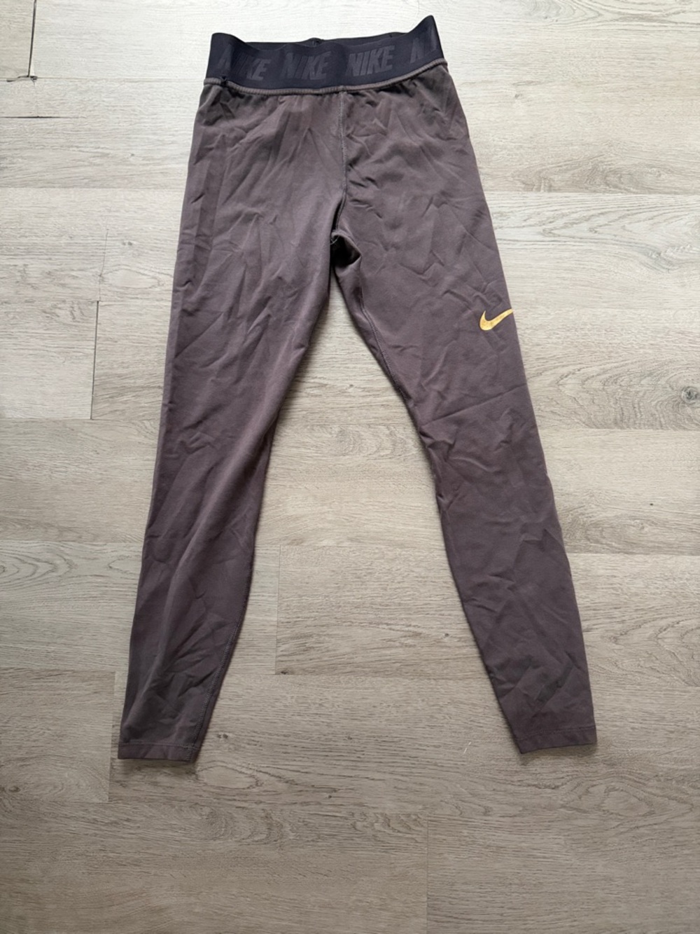 Nike Women’s Brown Leggings with Gold Swoosh